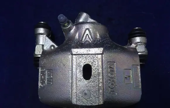 Toyota Corolla E100 Front brake caliper 52013 4773012410 UBD