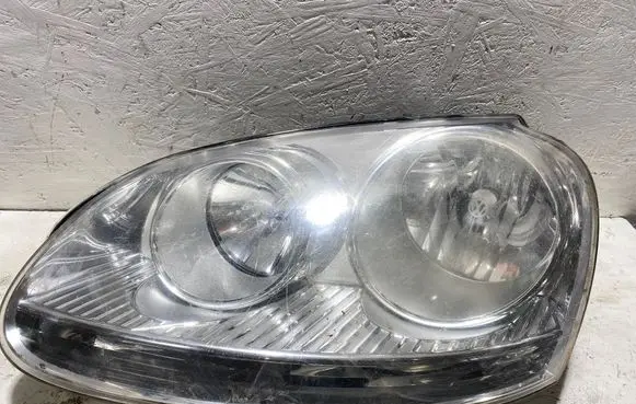 Volkswagen Golf V Headlight/headlamp 1EG24700709