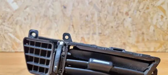 Dash center air vent grill