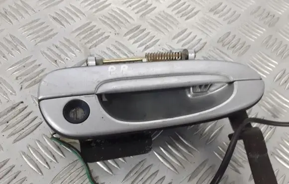 Mazda 626 Front door exterior handle/bracket BRAK