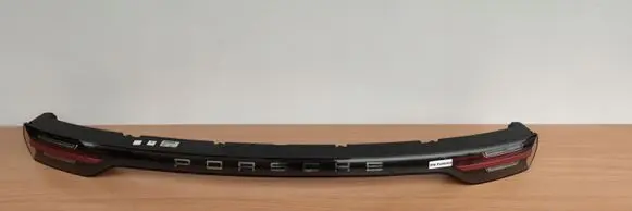 Porsche Cayenne (9Y0 9Y3) Rear light center trim bar blend 9Y0945081F