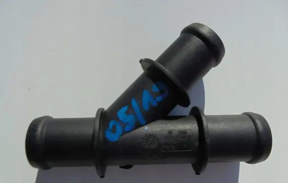 Volkswagen Polo V 6R Engine coolant pipe/hose 1K0121087Q