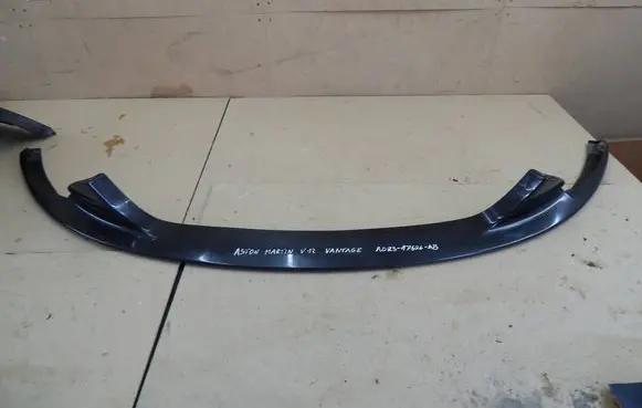 Aston Martin Vantage III Front bumper splitter molding AD23-17626-AB