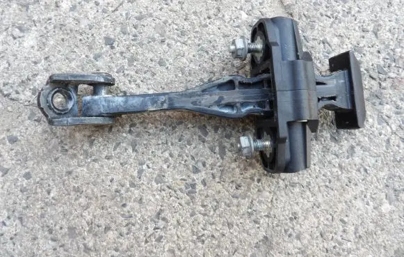 Ford Fiesta Front door check strap stopper AV11A23500AA