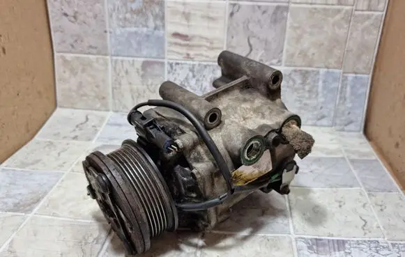 Ford Mondeo Mk III Air conditioning (A/C) compressor (pump) 1S7H19D629