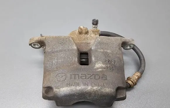 Mazda 3 III Front brake caliper