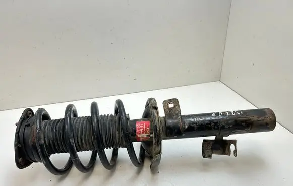 Front shock absorber with coil spring