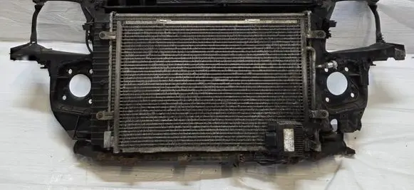 Radiator support slam panel