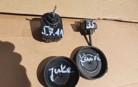Nissan Juke I F15 Headlight level adjustment motor 89909531 26060BV90B