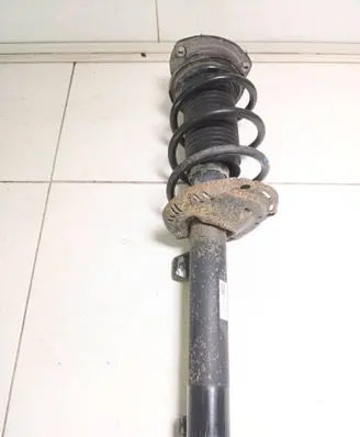 Volkswagen Golf VII Front shock absorber with coil spring 5Q0413023FK 5Q0413023