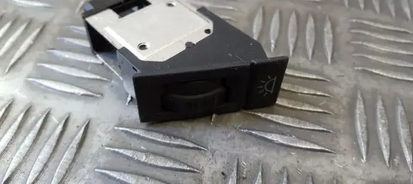 Panel lighting control switch