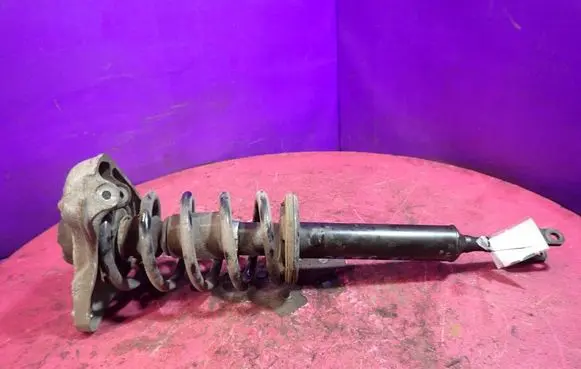 Front shock absorber with coil spring