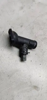 Volkswagen PASSAT B6 Engine coolant pipe/hose 03L121121A 03G121121D