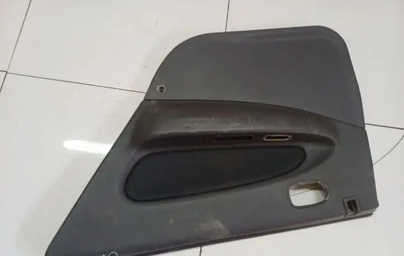 Mazda 323 Rear door card panel trim B21R52002