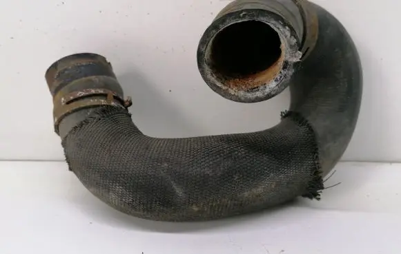 Opel Zafira A Engine coolant pipe/hose 1301637 24421116