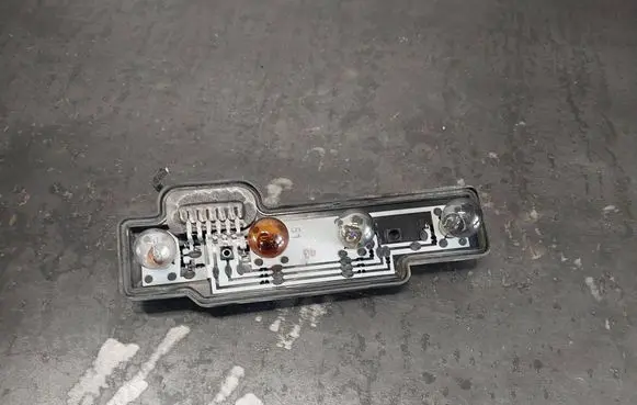 Volkswagen Caddy Tail light bulb cover holder 2K0945258A