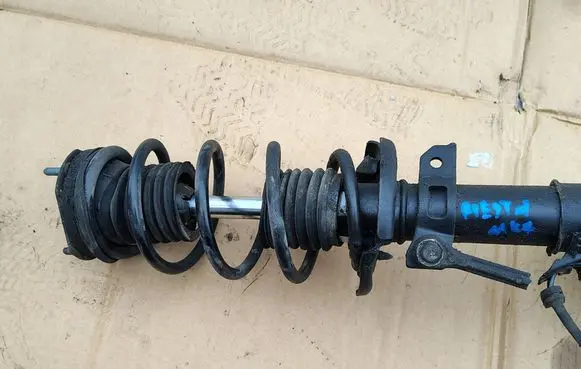 Ford Fiesta Front shock absorber with coil spring