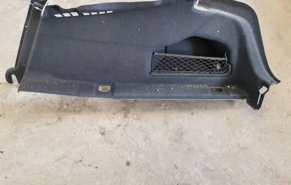 Trunk/boot lower side trim panel