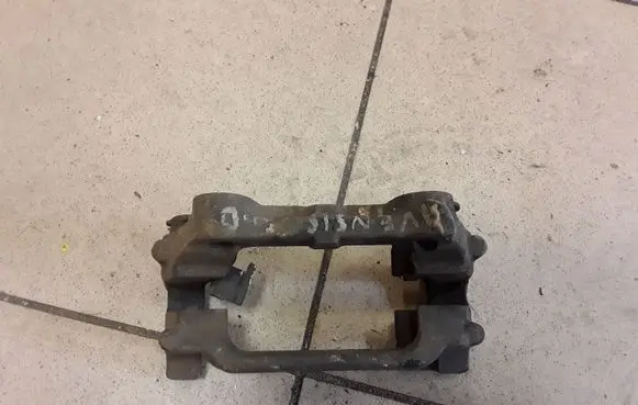 Toyota Avensis T250 Brake caliper pad carrier rear 2159W09366