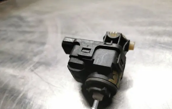 Mazda 323 Headlight level adjustment motor 