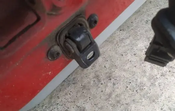 Rear door check strap stopper