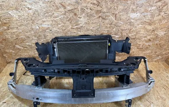 Radiator support slam panel
