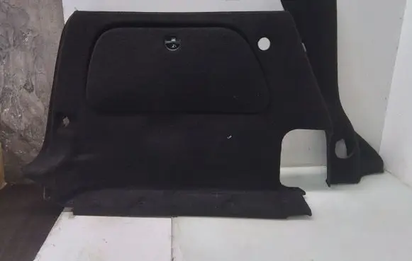 Trunk/boot lower side trim panel
