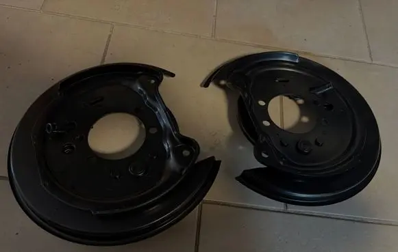 Subaru Legacy Rear brake disc plate dust cover 26704AE040 26704AE050