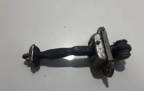 Nissan Primera Front door check strap stopper 