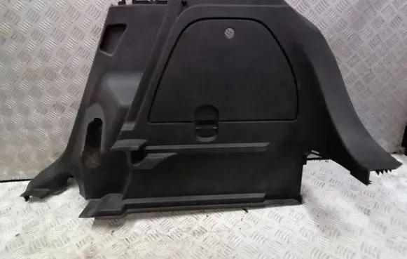 Trunk/boot lower side trim panel