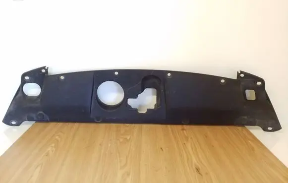 Engine bonnet/hood lock trim molding