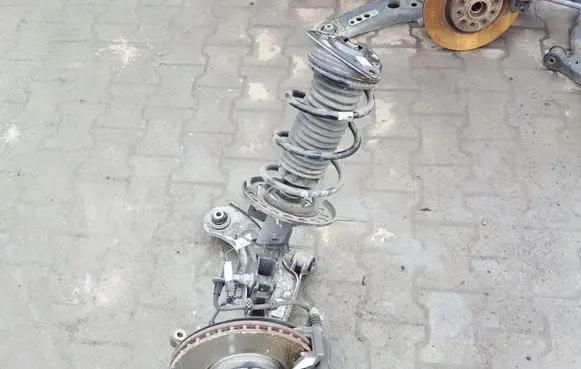 Front wheel hub spindle knuckle