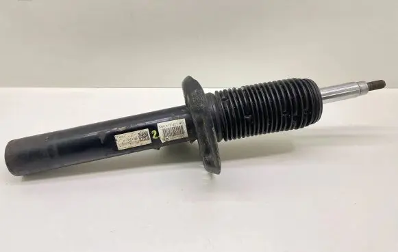 Volkswagen Tiguan Front shock absorber with coil spring 5N0412021HD 150216G0707