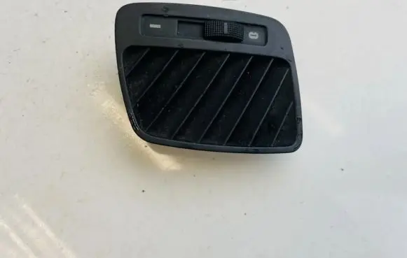 Dash center air vent grill