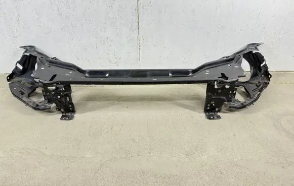 Radiator support slam panel