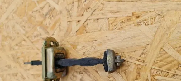 Volvo S40, V40 Front door check strap stopper