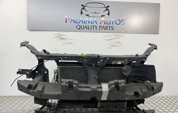 Radiator support slam panel
