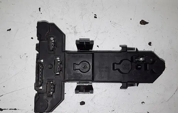 Tail light bulb cover holder