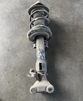 Mercedes-Benz E A207 Front shock absorber with coil spring A2073204138 2073204138