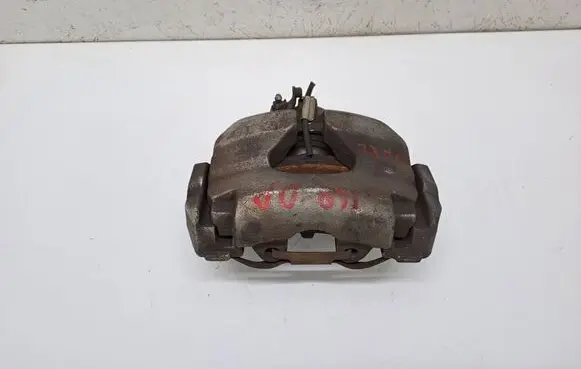 Volkswagen Touareg I Front brake caliper 7H0106E