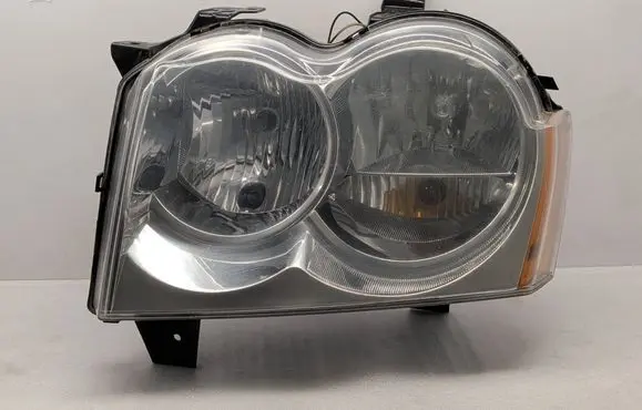 Jeep Grand Cherokee (WK) Headlight/headlamp 55156671AI