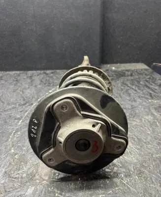 Front shock absorber with coil spring