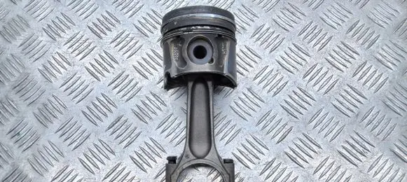 Piston with connecting rod