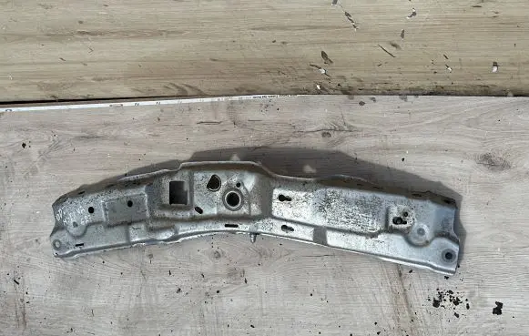 Top upper radiator support slam panel