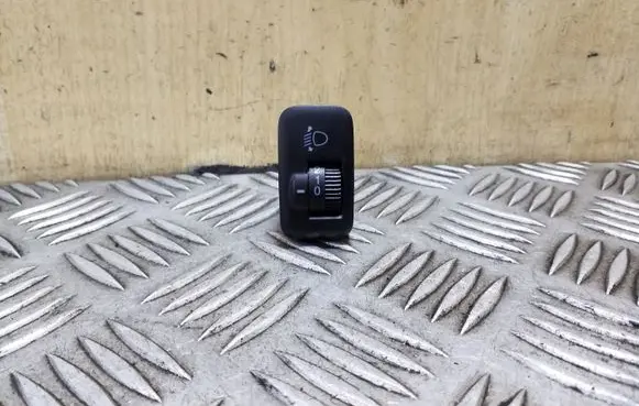 Headlight level height control switch