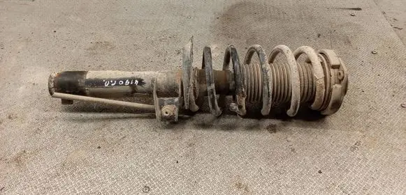 Volkswagen Caddy Front shock absorber with coil spring 
