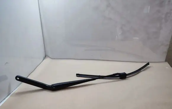 Front wiper blade arm