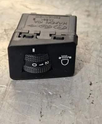 Headlight level height control switch