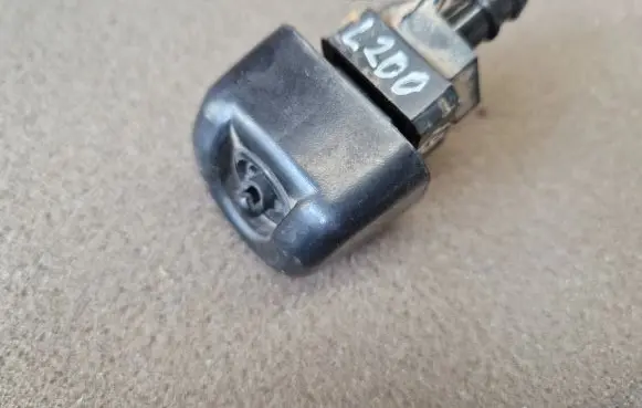 Mitsubishi L200 Headlight washer spray nozzle
