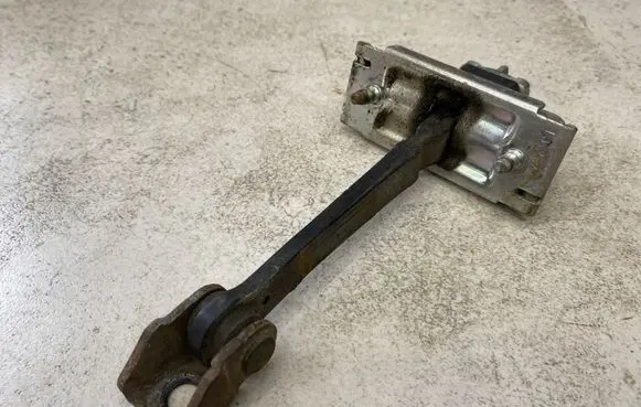 Opel Corsa D Rear door check strap stopper 13181961